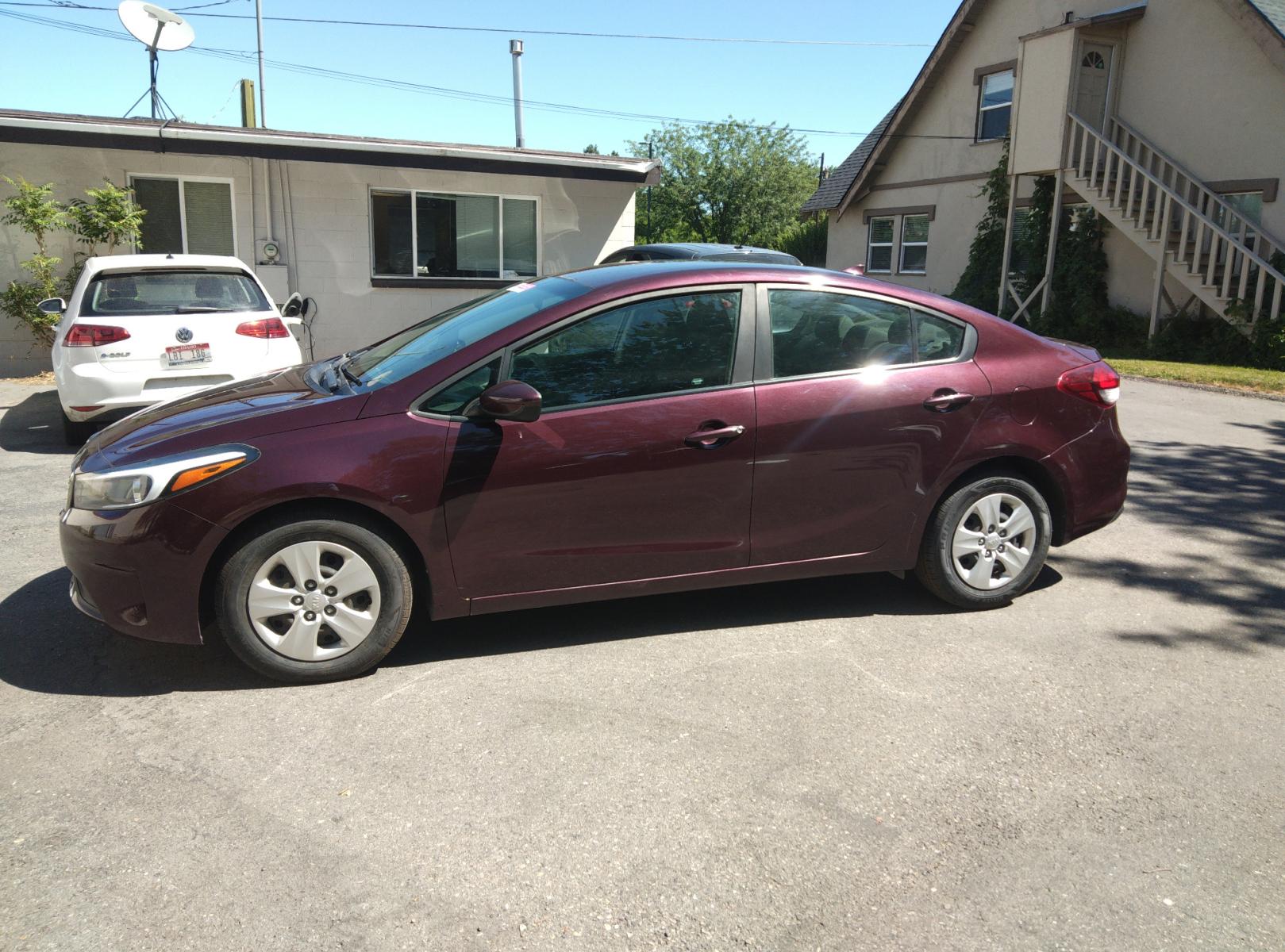 2017 Maroon /Black Kia Forte LX 6A (3KPFL4A78HE) with an 2.0L L4 DOHC 16V engine, 6A transmission, located at 3605 W Overland Rd., Boise, ID, 83705, (208) 863-0063, 43.589729, -116.226181 - This Kia Forte sedan is in excellent condition with 60,100 miles on it. It is maroon with black cloth interior. If you would like to come and test drive it, call us at 208 863-0063 to set up a time to drive it. Or stop by to see it. You will like it. - Photo #1