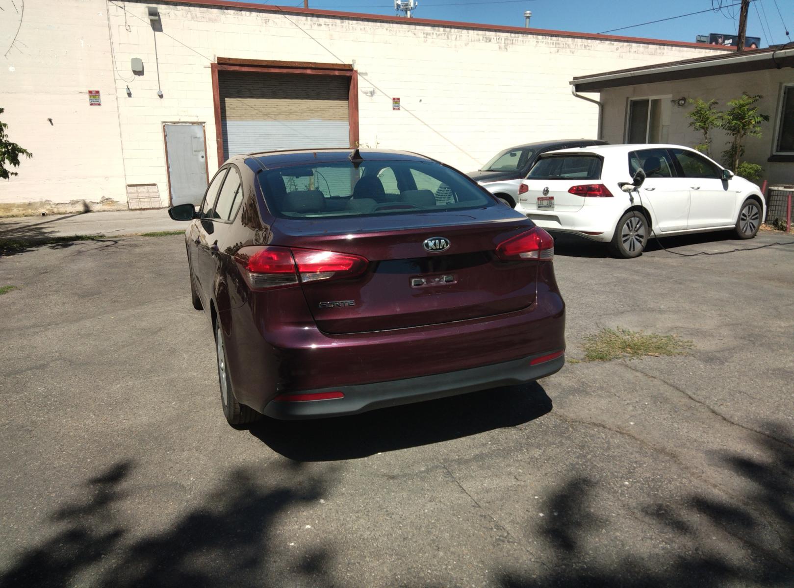 2017 Maroon /Black Kia Forte LX 6A (3KPFL4A78HE) with an 2.0L L4 DOHC 16V engine, 6A transmission, located at 3605 W Overland Rd., Boise, ID, 83705, (208) 863-0063, 43.589729, -116.226181 - This Kia Forte sedan is in excellent condition with 60,100 miles on it. It is maroon with black cloth interior. If you would like to come and test drive it, call us at 208 863-0063 to set up a time to drive it. Or stop by to see it. You will like it. - Photo #3