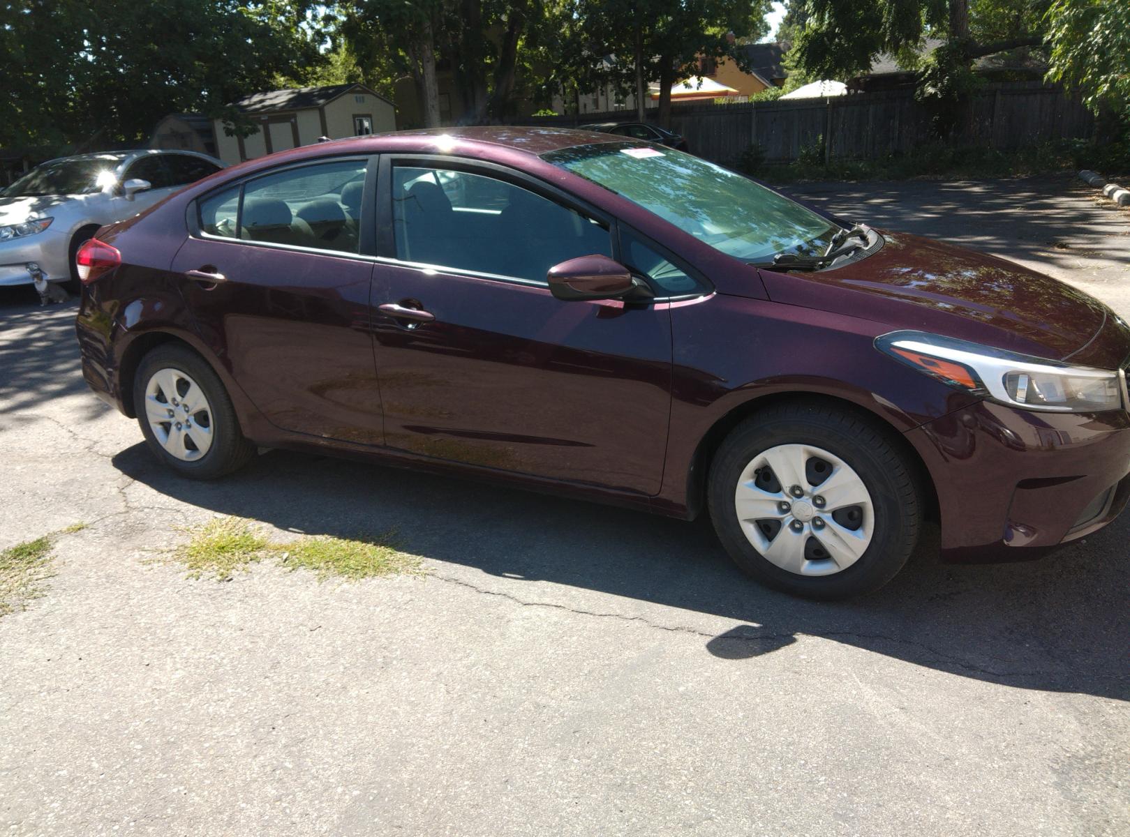 2017 Maroon /Black Kia Forte LX 6A (3KPFL4A78HE) with an 2.0L L4 DOHC 16V engine, 6A transmission, located at 3605 W Overland Rd., Boise, ID, 83705, (208) 863-0063, 43.589729, -116.226181 - This Kia Forte sedan is in excellent condition with 60,100 miles on it. It is maroon with black cloth interior. If you would like to come and test drive it, call us at 208 863-0063 to set up a time to drive it. Or stop by to see it. You will like it. - Photo #6