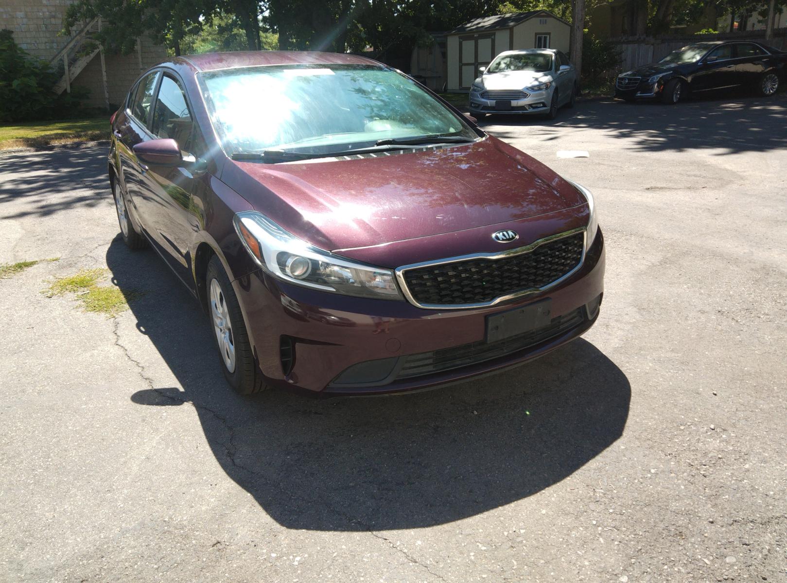 2017 Maroon /Black Kia Forte LX 6A (3KPFL4A78HE) with an 2.0L L4 DOHC 16V engine, 6A transmission, located at 3605 W Overland Rd., Boise, ID, 83705, (208) 863-0063, 43.589729, -116.226181 - This Kia Forte sedan is in excellent condition with 60,100 miles on it. It is maroon with black cloth interior. If you would like to come and test drive it, call us at 208 863-0063 to set up a time to drive it. Or stop by to see it. You will like it. - Photo #7
