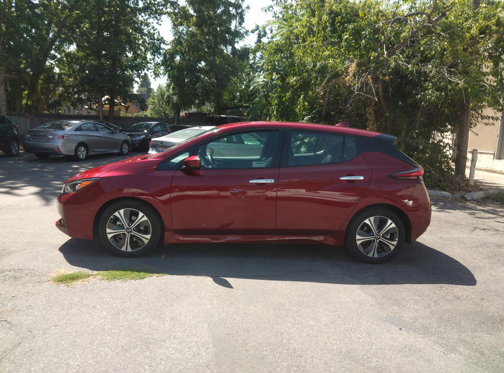 2021 /Black Nissan LEAF SV (1N4AZ1CV0MC) with an ELECTRIC engine, CVT transmission, located at 3605 W Overland Rd., Boise, ID, 83705, (208) 863-0063, 43.589729, -116.226181 - This 2021 Nissan Leaf is an electric vehicle that is in excellent condition with 17K miles on it. The exterior is a beautiful maroon, with black cloth interior. To seat up a test drive on this great electric car, call us at 208 863-0063 to set up a time. Or stop by to see it. - Photo #1